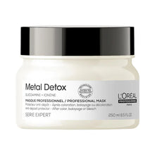 Load image into Gallery viewer, L'Oreal Professional Metal Detox Mask Metal Detox anti-deposit protector mask prevents new particles from coming back. Metal inside the fiber creates both a risk of breakage and negatively impacts colour results during colour, balayage and lightening services. Metal Detox anti-deposit protector mask protect the fiber from particle deposits after any colour, balayage or lightening service. This rich cream mask bring cosmeticity and prevent new metal particles from coming back.