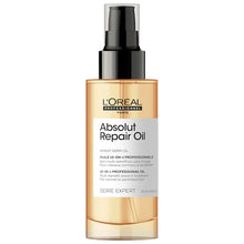 Load image into Gallery viewer, L'Oreal Professional Absolut Repair 10-in-1 Oil Treatment A lightweight, multi-use hair oil blended with gold quinoa and proteins that provides 10 treatment, styling, and protection benefits in one bottle. Hair Texture: Straight, Wavy, Curly, and Coily Hair Type: Fine, Medium, and Thick