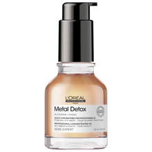 Load image into Gallery viewer, L'Oreal Professional Metal Detox Strengthening Hair Oil A lightweight hair oil with exclusive technology that acts as a barrier against harmful metals found in water to strengthen hair, add shine, reduce frizz, and provide color protection.