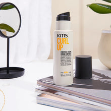 Load image into Gallery viewer, KMS CURLUP Control Creme shapes and bundles curls, provides lasting separation with a frizz free finish. Use to define curls and add shine. Use in dried hair to control frizz and bundle curls.