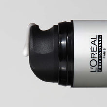 Load image into Gallery viewer, Loreal Professional Metal Detox High Protection CreamA lightweight, reparative leave-in styling cream that deeply moisturizes while protecting against harsh metals, UV rays, and heat from styling tools. Hair Texture: Straight, Wavy, Curly, and Coily Hair Type: Fine, Medium, and Thick
