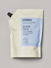 Load image into Gallery viewer, AG Xtramoist Moisturizing Shampoo Restore softness, manageability and shine with this gentle, salt-free, hyper-moisturizing shampoo. Xtramoist is specially formulated with a potent blend of hydrating honey extracts, hyaluronic acid, plus keratin protein and silk amino acids to restore moisture balance, elasticity, strength and shine.