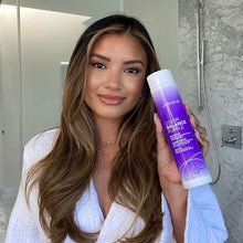 Load image into Gallery viewer, FOR BLONDE & SILVER HAIR COLOR BALANCE PURPLE SHAMPOO When blonde hair loses its cool, reach for this instant, corrective shampoo for color-treated hair that ditches unwanted yellow tones. The unique formula -- designed to preserve highlighted, icy blondes, silvery grays, ombré, and balayage looks, while safeguarding the vibrancy of color-treated hair – banishes brassy warmth, shields hair from the elements, and boosts shine and strength.