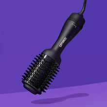 Load image into Gallery viewer, Amika Hair Blow Dryer is a 2 in 1 blow dryer and brusg in one, add volume, smooths hair , add shine , make it easy to style hair