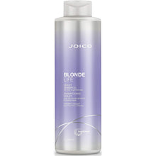 Load image into Gallery viewer, BLONDE LIFE VIOLET SHAMPOO When you want to bring blonde hair back to that icy, fresh-out-of-the-salon shade, turn to this sulfate-free cleanser that instantly kicks yellow tones to the curb. Gentle on highlighted strands, this unique formula is stocked with powerful ingredients -- like an exotic blend of rich Tamanu and Manoi oils – to fight frizz, banish brass, and rehydrate hair.