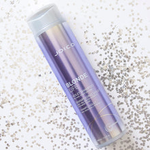Load image into Gallery viewer, BLONDE LIFE VIOLET SHAMPOO When you want to bring blonde hair back to that icy, fresh-out-of-the-salon shade, turn to this sulfate-free cleanser that instantly kicks yellow tones to the curb. Gentle on highlighted strands, this unique formula is stocked with powerful ingredients -- like an exotic blend of rich Tamanu and Manoi oils – to fight frizz, banish brass, and rehydrate hair.