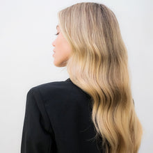 Load image into Gallery viewer, IGK First Class weightless replenishing conditioner restores natural shine and softness to your hair. Its weightless formula protects and soothes the scalp while reducing frizz and adding moisture without weighing your hair down. Ideal for use after First Class Detoxifying Shampoo and for all hair types. A weightless conditioner that replenishes lost nutrients, soothes the scalp,