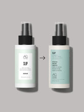Load image into Gallery viewer, AG Slip Vitamin C Dry Oil Spray . Slip helps hair feel soft to the touch. This vegan, lightweight dry oil spray disperses a fine mist on hair to instantly add smoothness and shine.