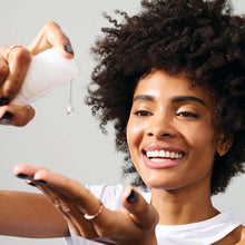 Load image into Gallery viewer, OLAPLEX SERUM A weightless, leave-in styling serum that’s rich in antioxidants to help protect from pollution, heat, and future damage for shine, bounceback curls, and anti-static and anti-tangle action. Can be used on clean, damp hair and reapplied between washes.