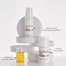 Load image into Gallery viewer, OLAPLEX SERUM A weightless, leave-in styling serum that’s rich in antioxidants to help protect from pollution, heat, and future damage for shine, bounceback curls, and anti-static and anti-tangle action. Can be used on clean, damp hair and reapplied between washes.