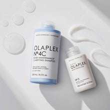 Load image into Gallery viewer, Clarifying System removes damaging product buildup, excess oil, hard water minerals, chlorine, and even heavy metals and pollution. It’s sulfate-free and pH balanced to maintain hydration. OLAPLEX shampoo