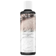 Load image into Gallery viewer, This deep cleansing IGK First Class shampoo gently removes impurities without stripping or drying hair out. Charcoal gently detoxifies, removing build-up and color-dulling residues from dry shampoos, styling products, chlorine, hard water and pollution. Witch Hazel and Tea Tree Oil soothe the scalp. A charcoal clarifying shampoo that gently detoxifies and cleanses, absorbing excess oil and buildup from the scalp, while restoring hair color and shine. Great for straight, wavy, curly and coily hair types