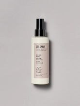 Load image into Gallery viewer, AG Sea Spray Beachy Wave Finish We’ve bottled up the beach to help you create gritty, wavy texture and volume using this unique formula enhanced with AG’s Sea Complex, an infusion of three naturally texturizing seaweed extracts plus nourishing seaberry oil