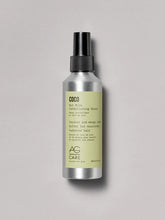 Load image into Gallery viewer, AG Coco Nut Milk Conditioning Spray. Detangle, strengthen and hydrate hair, helping it feel soft and manageable with this silicone-free conditioning spray infused with coconut, macadamia extract and mango seed butter. Ideal for medium to thick hair types or those prone to knots
