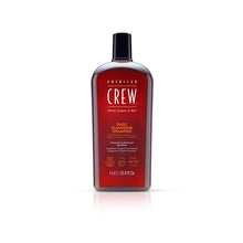 Load image into Gallery viewer, our silicone-free Daily Cleansing Shampoo is ideal for an everyday haircare routine. The nondrying vegan formula washes away excess oil, leaving hair more manageable, looking healthy, and feeling soft. Infused with our energizing, naturally certified American Crew Citrus Mint signature fragrance