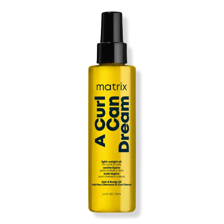Matrix A Curl Can Dream Lightweight Oil is for curls and coils and infused with sunflower seed oil. This is the perfect finisher to separate out curls and add shine.