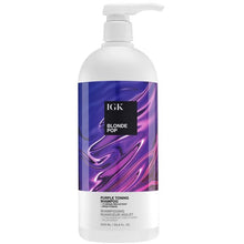 Load image into Gallery viewer, Instantly neutralize brass, soften strands, moisturize, and add shine with this blonde-enhancing shampoo. Treat blonde and highlighted hair to the ultimate balance between color-toning pigments and essential moisture for 7x reduced brassiness and a brighter, more vibrant look. Boosted with violet pigment, purple rice, and moisture-rich squalane to restore essential moisture, brilliance, and shine.
