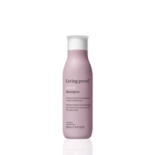 Load image into Gallery viewer, Living Proof Restore Shampoo A gentle shampoo that’s the first step to making dry, damaged hair feel and look visibly healthier.     Helps restore damaged hair cuticles Strengthens and protects hair from damage
