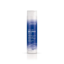 Load image into Gallery viewer, FOR BRASSY BRUNETTES COLOR BALANCE BLUE SHAMPOO  Kick brass to the curb and keep rich brunette hair free of unwanted orangey tones with this targeted color-correcting shampoo that instantly neutralizes warmth as it gently cleanses. With a perfect balance of color protection and ingredients that strengthen each strand, you’ll get super shine, 2X stronger hair, and true-to-hue color.
