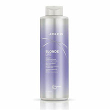 Load image into Gallery viewer, BLONDE LIFE VIOLET CONDITIONER  This lightweight, daily conditioner is exclusively formulated to banish yellow tones that can creep into highlighted blonde hair. Offering luxurious slip and detangling power, plus hydration, protection from the elements, and even frizz, our multi-tasking blonde nourisher is stocked with an exotic blend of rich Tamanu and Manoi oils -- perfectly designed to bump up the shine of your icy fair hair.
