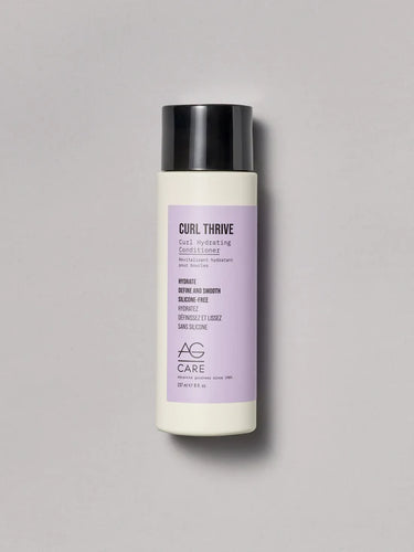 AG  Curl Thrive Hydrating Conditioner. Curl confidence is rooted in moisture. Quench parched strands with Curl Thrive conditioner, a luxurious and hydrating formula that fights frizz and helps define curls