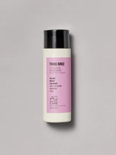 Load image into Gallery viewer, AG Thikk Rinse Volumizing ConditioneR Fine hair needs weightless conditioning. Infused with body building volumizers like panthenol, keratin and silk protein that nourish fine hair without weighing it down.
